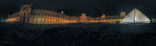 Le musée du Louvre et sa pyramide de verre la nuit